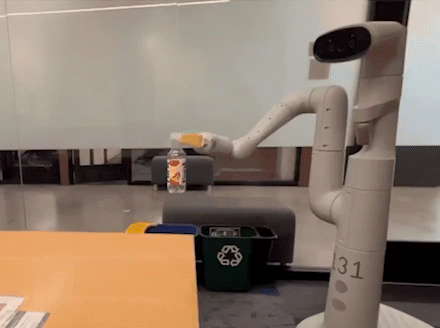 Robot does a bottle flip [GIF]